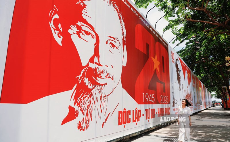 The streets of Ho Chi Minh City are brightly decorated with flags and flowers, celebrating the 80th anniversary of National Day on September 2