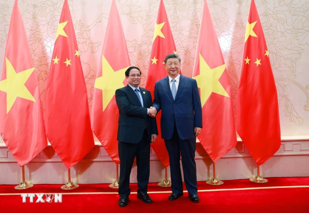 Thu tuong Chinh phu Pham Minh Chinh hoi kien Tong Bi thu, Chu tich nuoc Trung Quoc Tap Can Binh. Anh: TTXVN