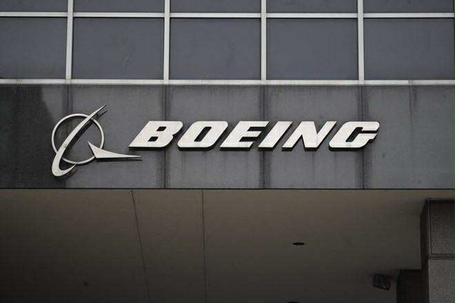 Logo cua Boeing tai tru so o Chicago, My. Anh: Xinhua