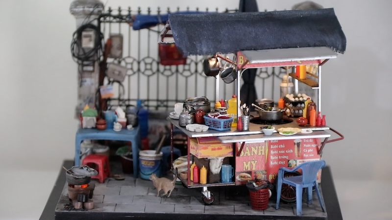 Gen Z 소년의 미니 모델을 통해 하노이를 감상하세요.