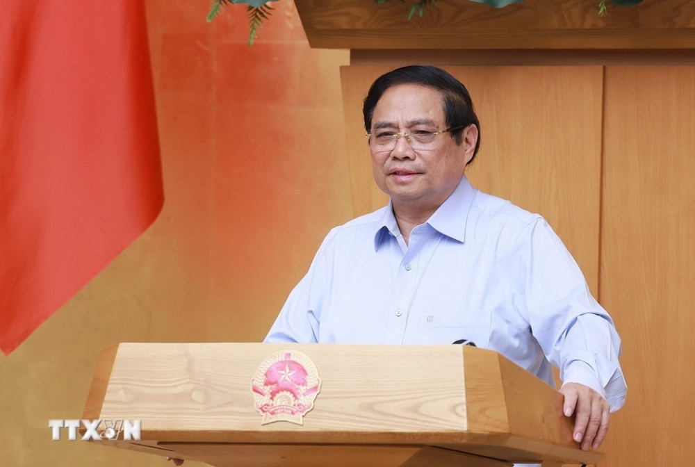 Prime Minister Pham Minh Chinh suggested that localities that have raised problems should be resolved by the Central Government in the operation of local government at both levels. Photo: VNA