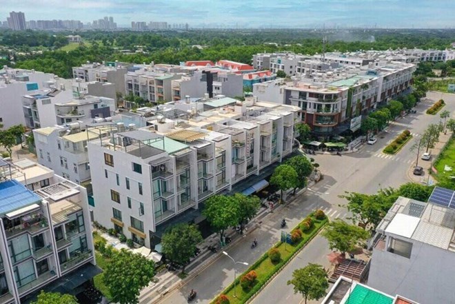 Nguoi dan mua nha tai du an khu nha o khu dan cu Duong Hong, huyen Binh Chanh truoc day van chua co so hong du 20 nam nay. Anh: Tam Duc 