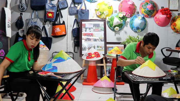 Art conical hats and the livelihood of disadvantaged workers in Hanoi.