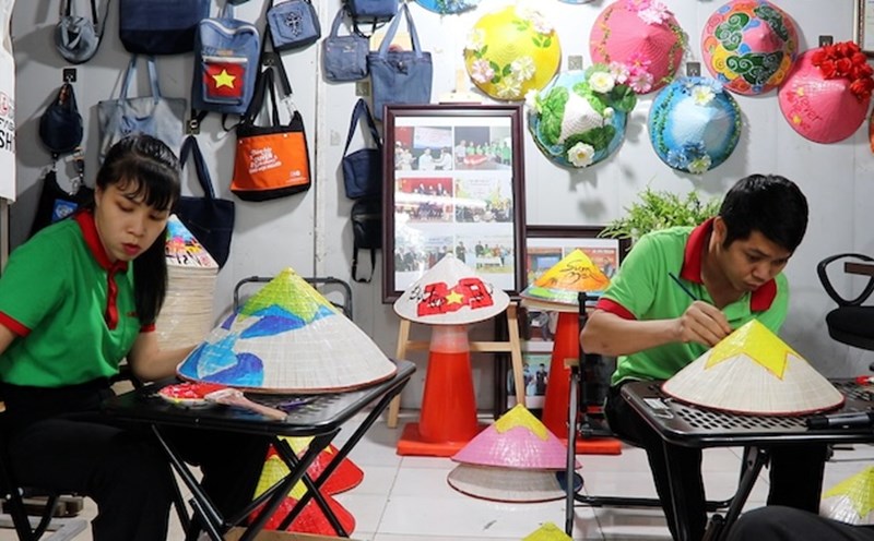 Art conical hats and the livelihood of disadvantaged workers in Hanoi.