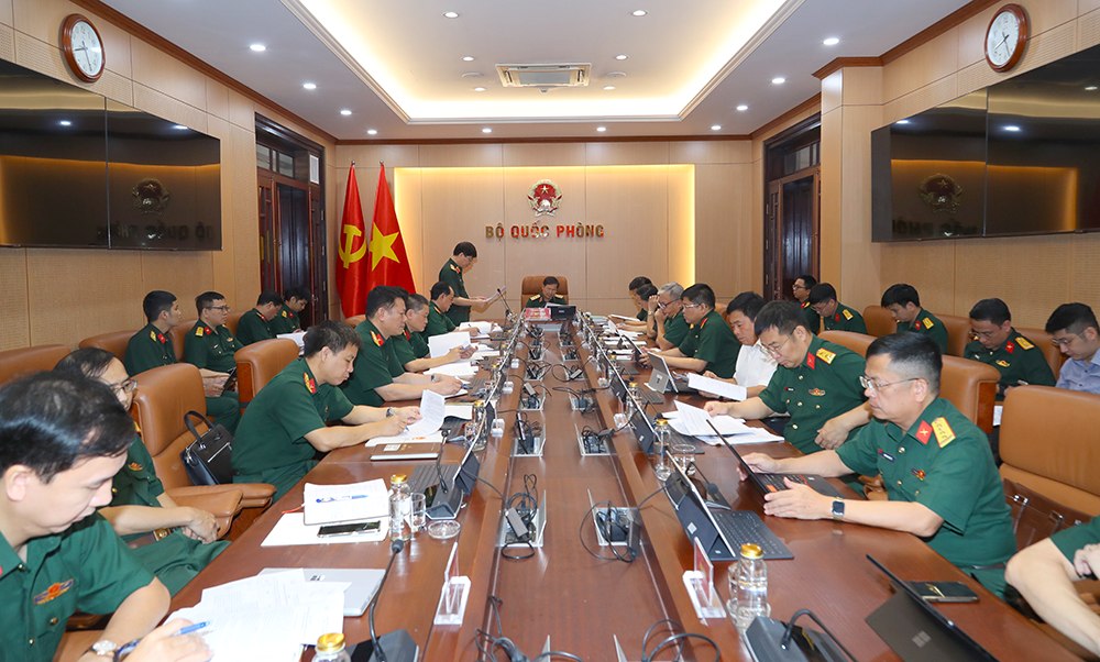 Hoi nghi bao cao tinh hinh trien khai thuc hien gui, nhan van ban dien tu co do mat la “Mat” tren mang truyen so lieu quan su. Anh: Bo Quoc phong