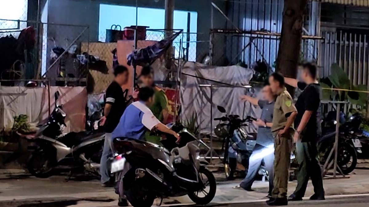 Scene du meurtre qui a fait 2 morts et 1 blesse a Ho Chi Minh-Ville. Photo : Dinh Trong