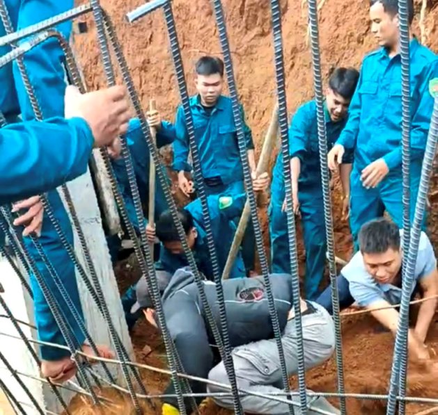 機能的な力とQuang Ngaiの人々の人々の犠牲者の人々が埋葬されました。写真：ウィーン・ヌグエン