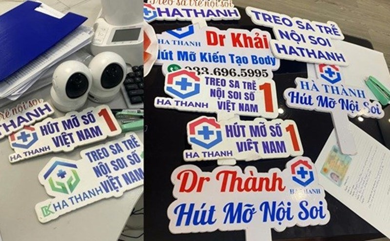 Advertising signs, tools and documents seized at the cosmetic facility impersonating Ha Thanh Hospital. Photo: Hanoi Police