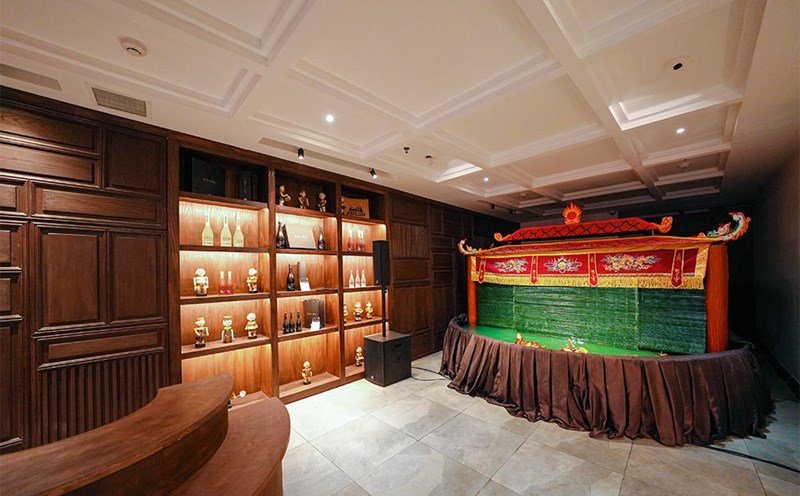 Water puppetry is introduced to the restaurant space. Photo: Van Hoa