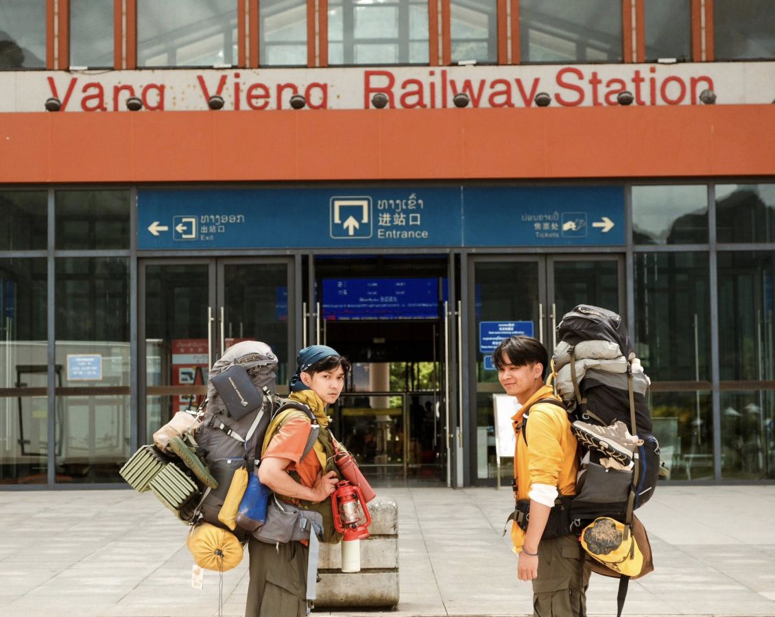 Duc Anh (right photo) and Hoang Duy take the train from Vang Vieng station, Laos. Photo: Lo Huu Duc Anh