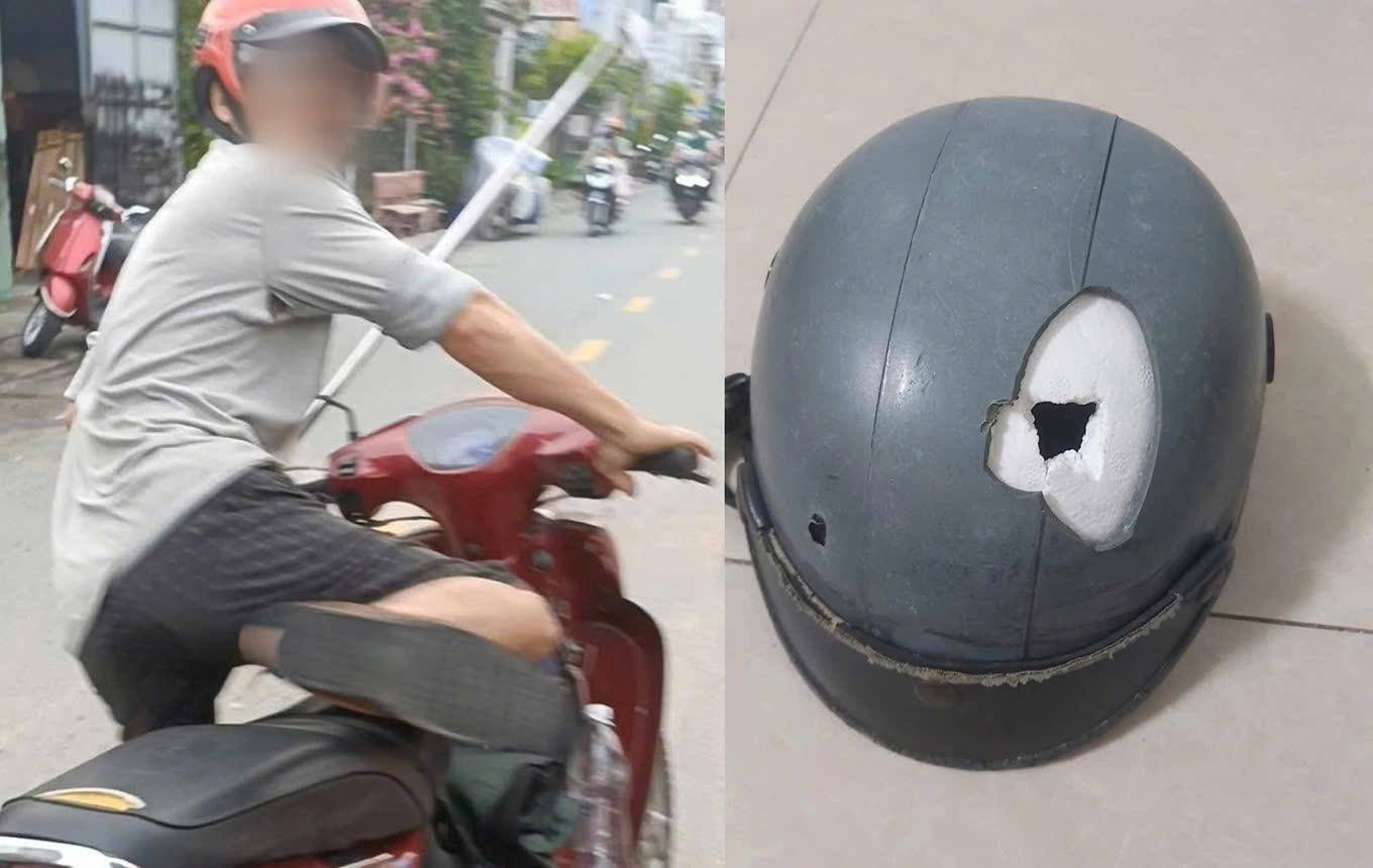  Người đàn ông cầm gậy sắt đánh vỡ mũ bảo hiểm của người đi đường ở TPHCM. Ảnh: Nạn nhân cung cấp
