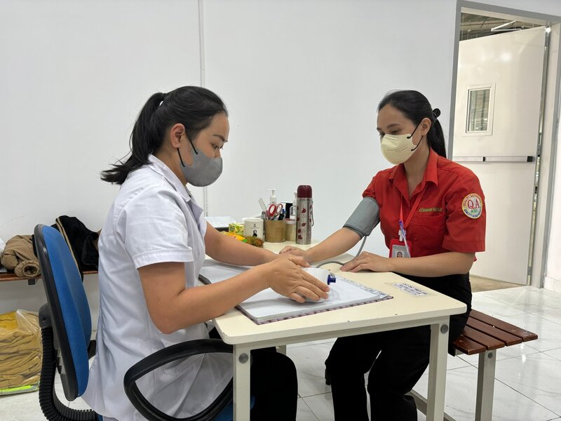 Les travailleurs de la societe a responsabilite limitee Kanaan Bao Loc beneficient d'un soutien maximal pour accomplir leur fonction de mere et prendre soin de leur famille. Photo : Do Lam