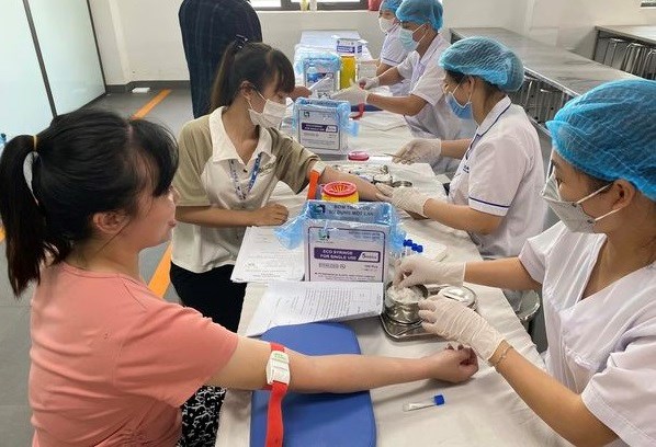 決議72-NQ/TWにおける医療部門における9つの優先政策。写真:ヴー・ Nga