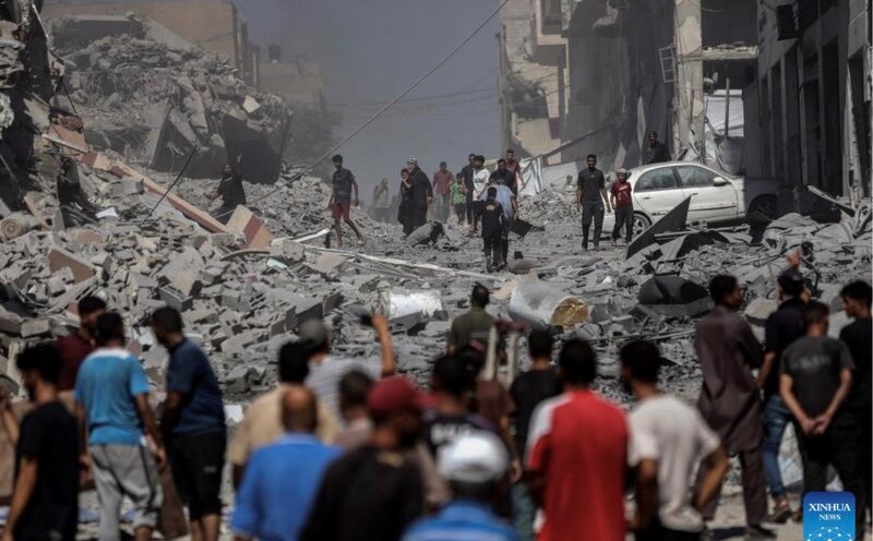 People fled as Israel attacked Gaza city. Photo: Xinhua