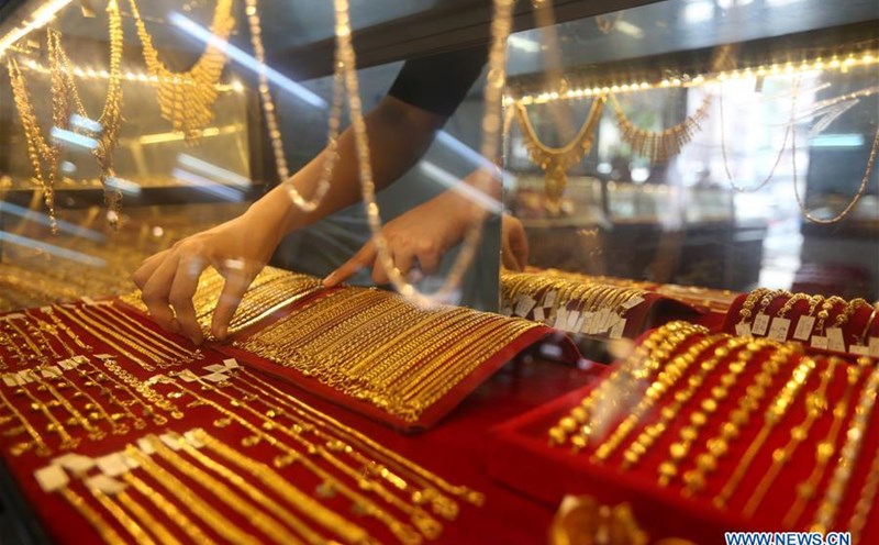 World spot gold prices fell nearly 1% to $3,658.25/ounce after the Fed cut interest rates on September 17, 2025. Photo: Xinhua