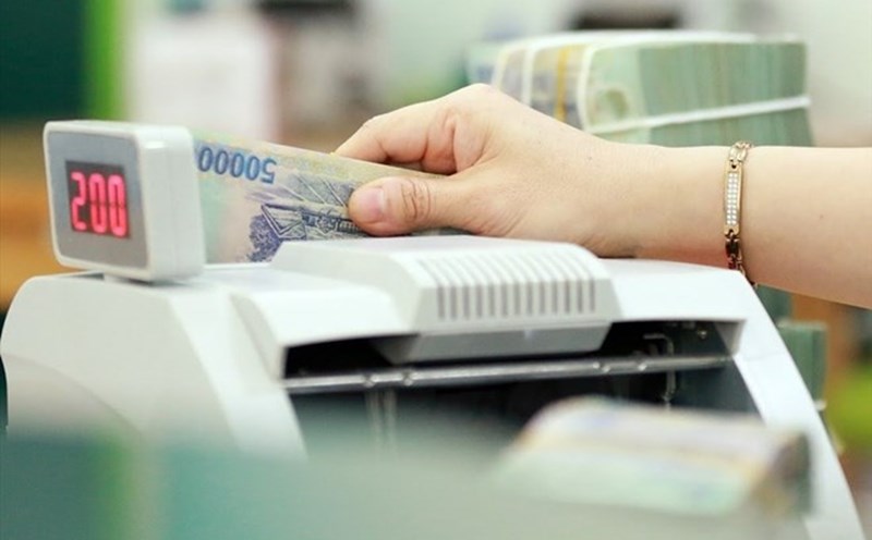 El Banco Estatal de Vietnam emitio 2 decisiones sobre la creacion de un entorno y condiciones de prueba para la solucion de prestamo igualitario el control del saldo de deuda y la conexion con CIC. Foto: Hai Nguyen