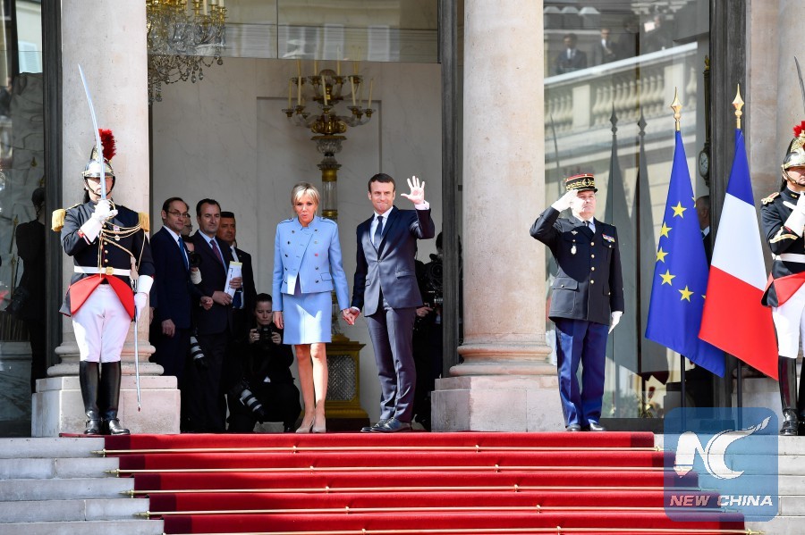에마뉘엘 마크롱 프랑스 대통령과 영부인 브리지트 마크롱. 사진: 신화통신
