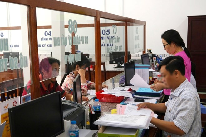 Ajouter des reglementations sur la competence de copier et de photographier les documents et objets contenant des secrets d'Etat pour le niveau communal. Photo : Ta Quang.