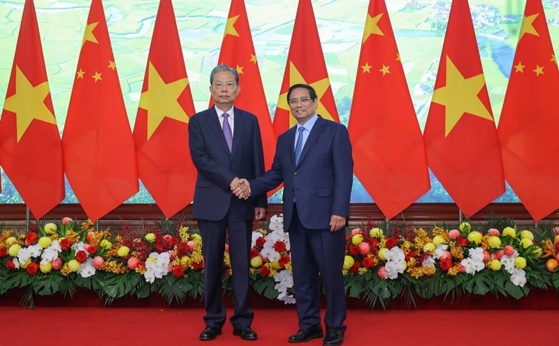 Politburo member, Prime Minister Pham Minh Chinh and Politburo member, Head of the Standing Committee of the National People's Congress of the People's Republic of China Zhao Lixi. Photo: VGP