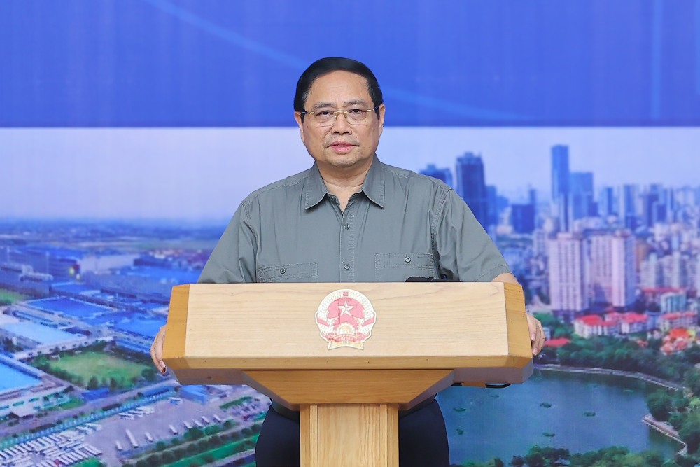 El miembro del Buro Politico y Primer Ministro Pham Minh Chinh pidio a la region del Delta del Mekong que resuelva muchos problemas candentes como la vivienda y la contaminacion. Foto: Nhat Bac