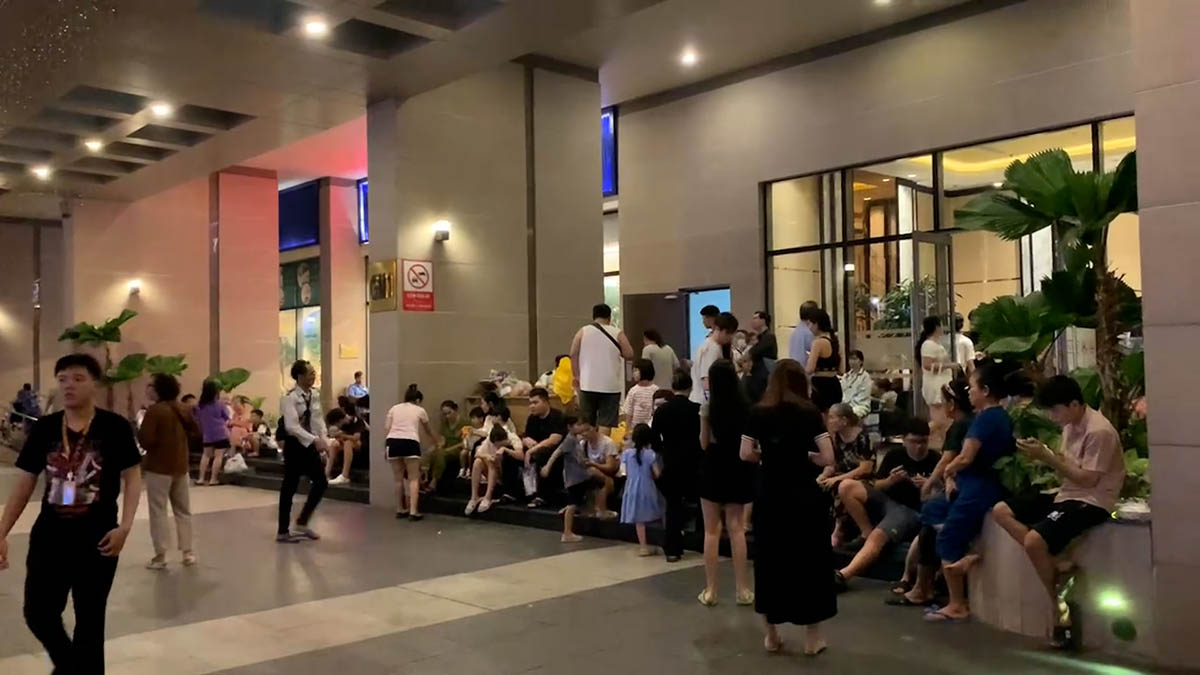 Scene de l'incendie d'un immeuble d'habitation de 22 etages a Ho Chi Minh-Ville les residents paniques se sont enfuis. Photo : Thai Bao