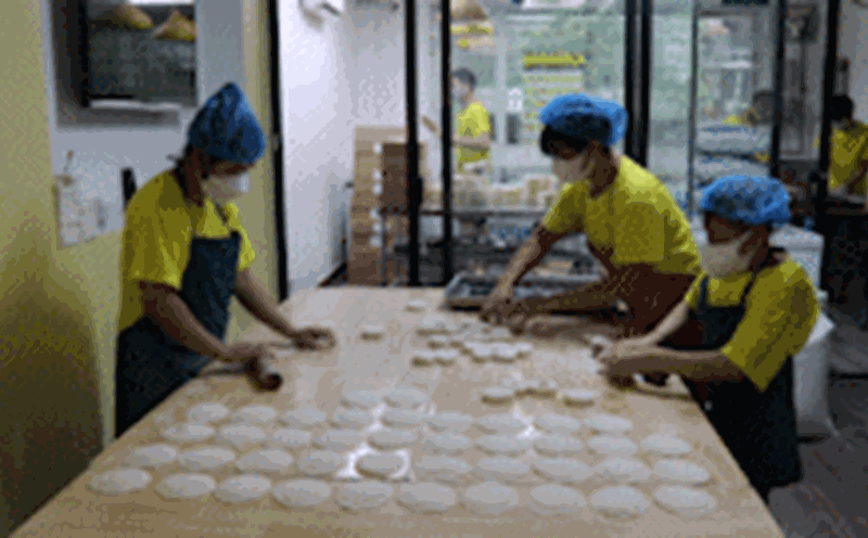 The shelter of disabled workers in the bag making workshop in the heart of Hanoi.
