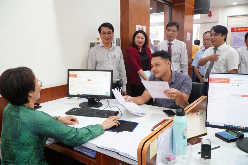 Thuc hien Ke hoach 130, Da Nang cho Trung uong huong dan de tinh gon bo may. Anh: Truong An