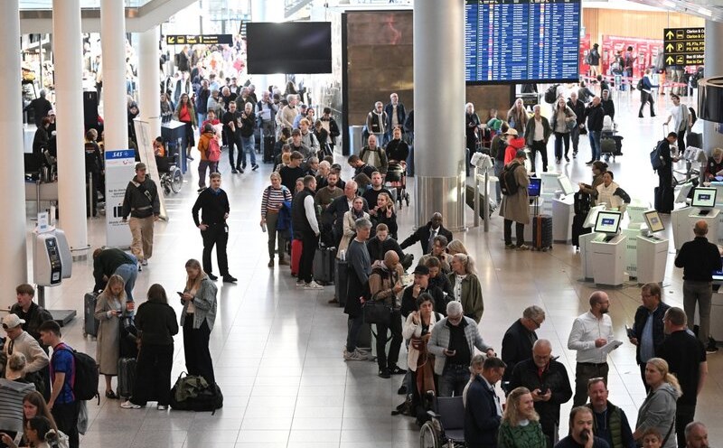 Passengers await at Copenhagen airport due to flight delays due to strange UAVs on September 23. Photo: AFP