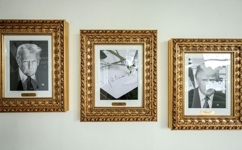 A portrait of Mr. Trump and a "portrait" of Mr. Joe Biden hangs at the "Presidential shot of Reputation" at the White House. Photo: White House