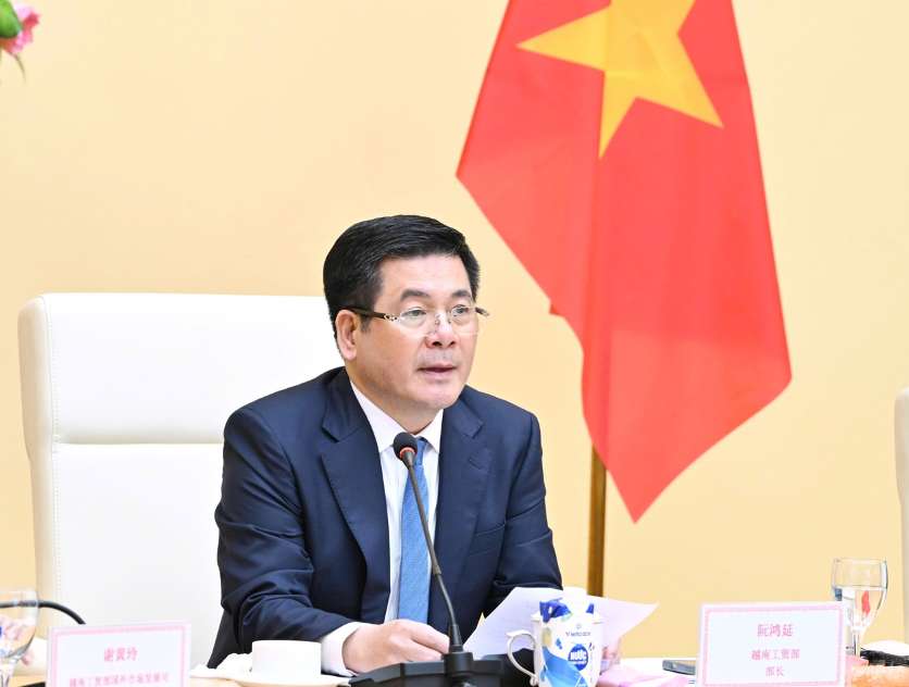 Bo truong Nguyen Hong Dien danh gia chuyen tham Viet Nam cua dong chi Lam Vu - Bi thu Tinh uy Son Dong (Trung Quoc). Anh: Bo Cong Thuong