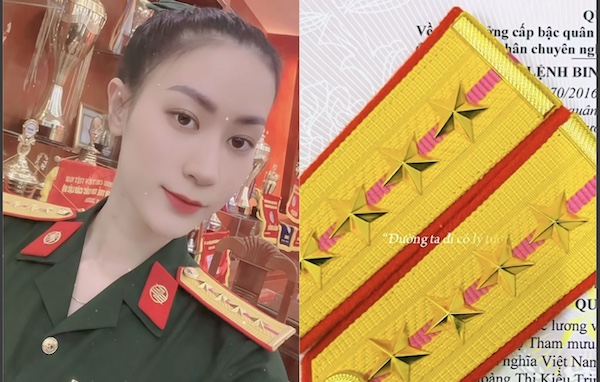 Kieu Trinh thang quan ham len Dai uy QNCN. Anh: Chup tu trang ca nhan