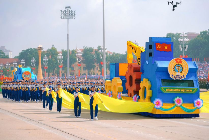 The Vietnam Workers' parade block passed the stage. Photo: Tuan Anh