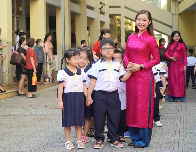 So Giao duc va Dao tao TPHCM de nghi cac cơ so giao duc trên dia ban thanh pho han che trang tri hoa tươi trong le khai giang. Anh: Chan Phuc