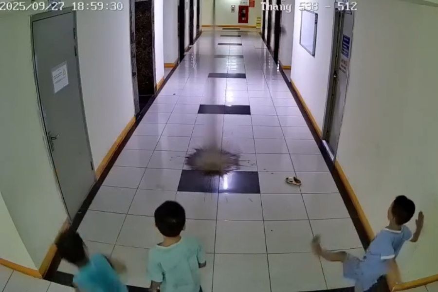 The 3 boys threw their sandals and broke the fire spraying pipe, damaging 2 elevators. Photo cut from clip