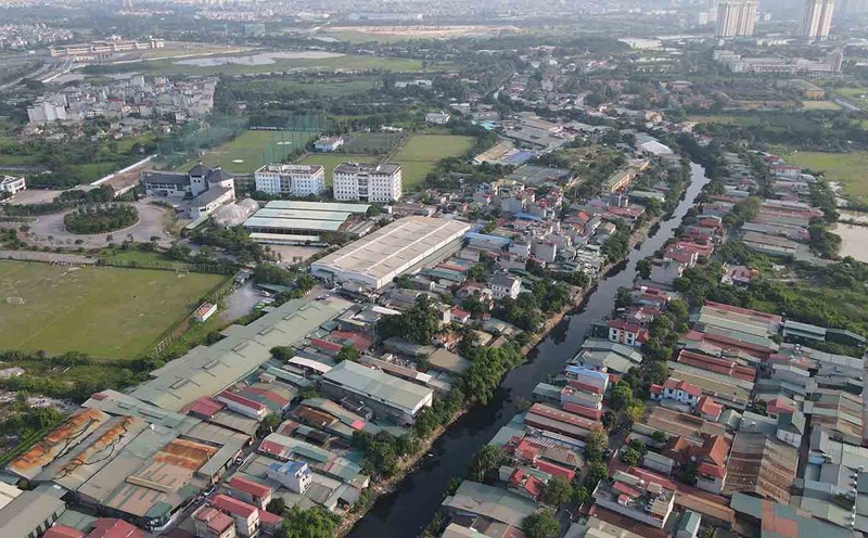 Urgently advise on the implementation of a unified land price framework after merging provinces and cities. Photo: Pham Dong