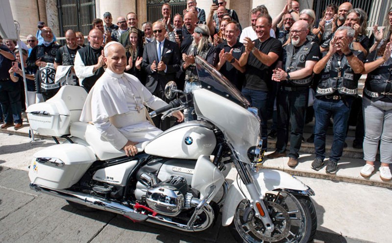 Pope Leo XIV riding a BMW motorbike donated on September 3. Photo: AFP