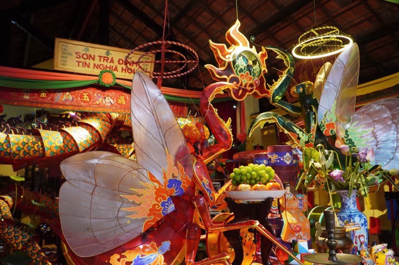 The hundred-year-old communal house in Ho Chi Minh City is brightly decorated with traditional Mid-Autumn Festival lanterns