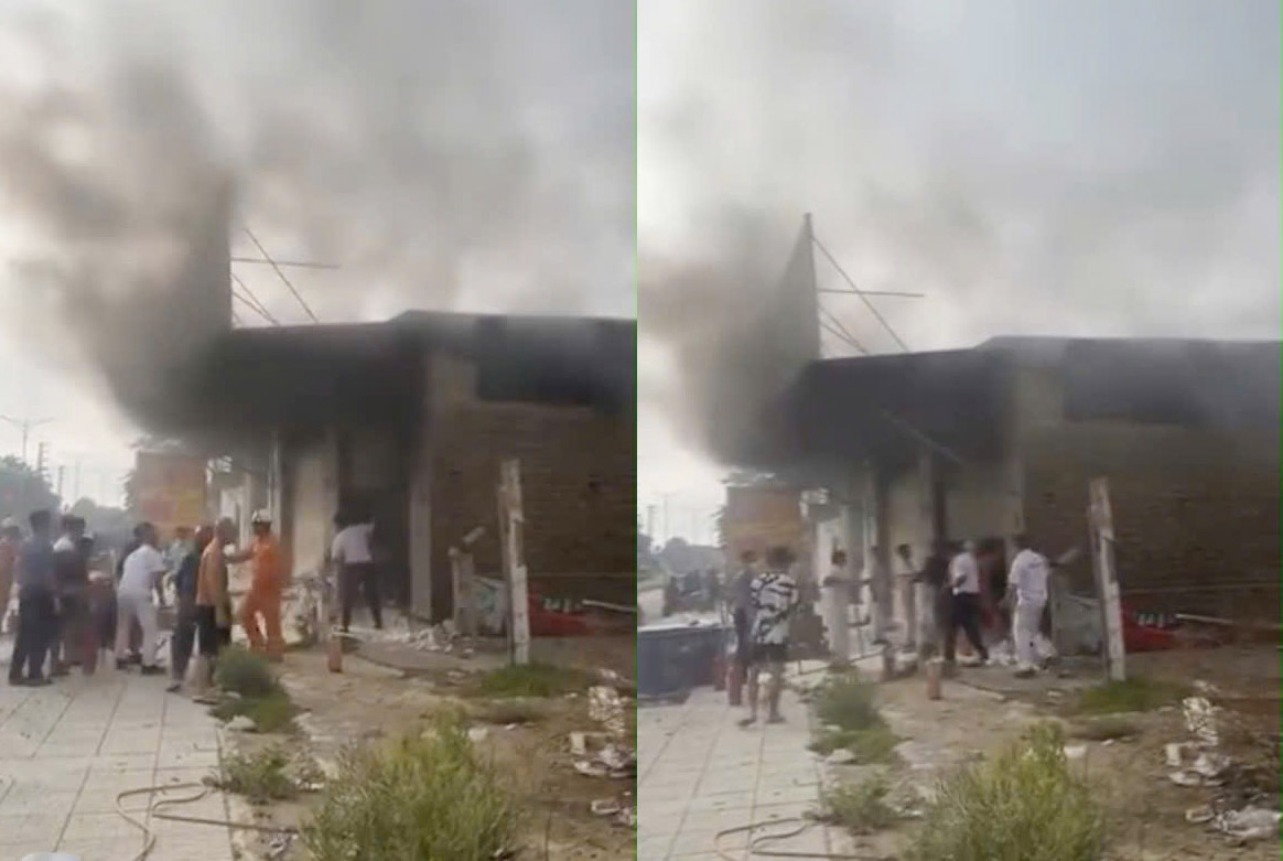 Incendie d'un centre de livraison rapide dans la commune de Huong Khe. Photo tiree d'un clip.