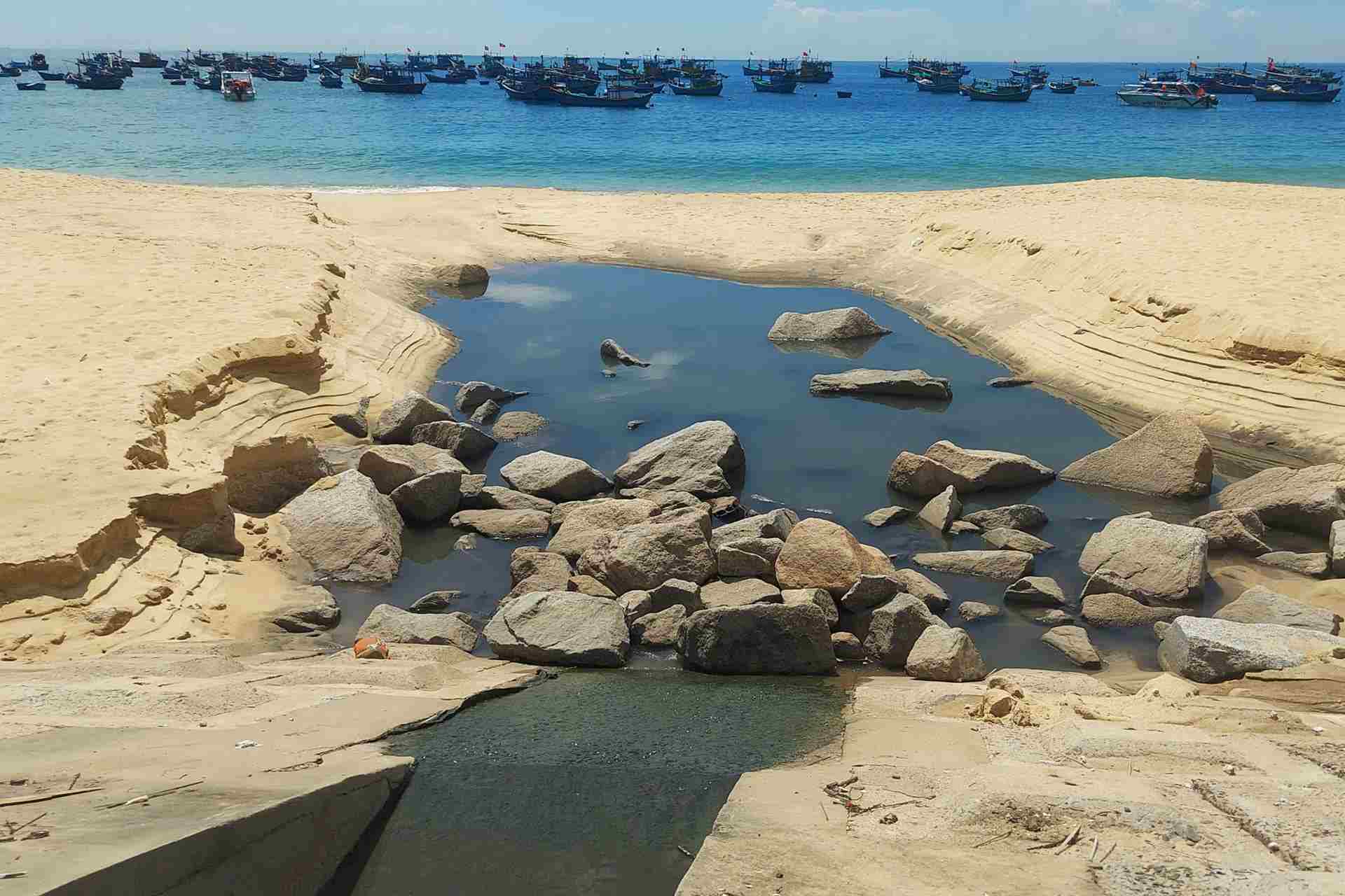 The domestic wastewater sewers in Ly Chanh village discharged directly onto the beach. Photo: Hoai Phuong