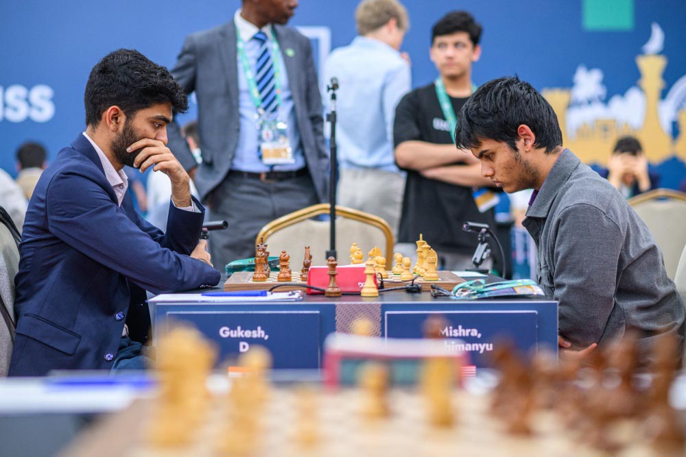 Mishra (right) in the match against Gukesh in round 5 of FIDE Grand Swiss. Photo: International Chess Association