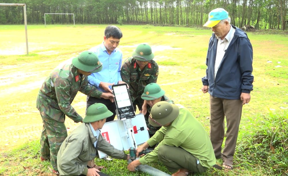 The army lights up rural roads for people to celebrate Spring and welcome Tet. Photo: Quang Dao