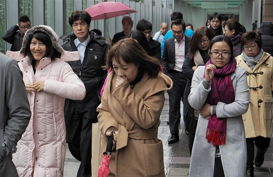 Cold air is coming in, causing temperatures to drop deeply. Photo: Xinhua