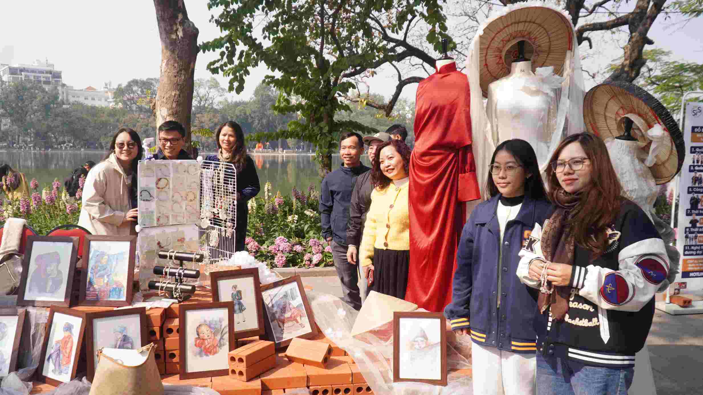 Tourists are excited about traditional costumes stepping into life today by telling new stories. Photo: Minh Vu.