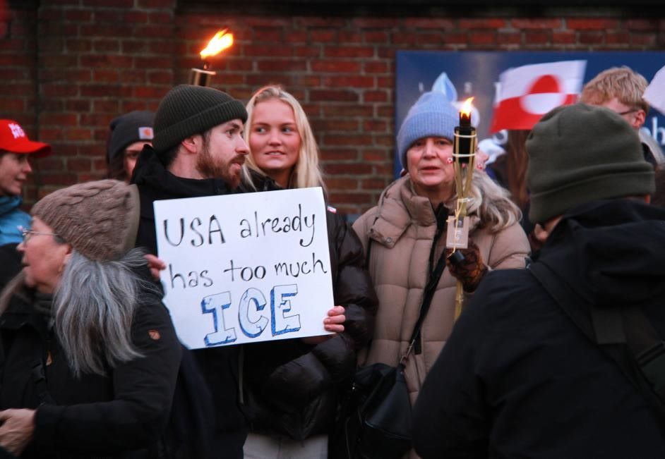 People protest against the US plan for Greenland in Copenhagen, Denmark, January 14, 2026, with a sign saying: "The US has too much ice already". Photo: Xinhua