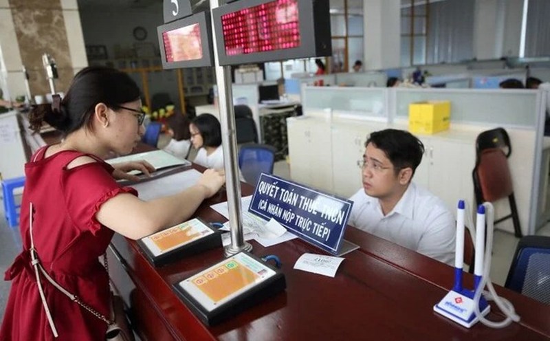 Instructions to remove obstacles when dependents have 2 parallel tax codes. Photo: Hai Nguyen.