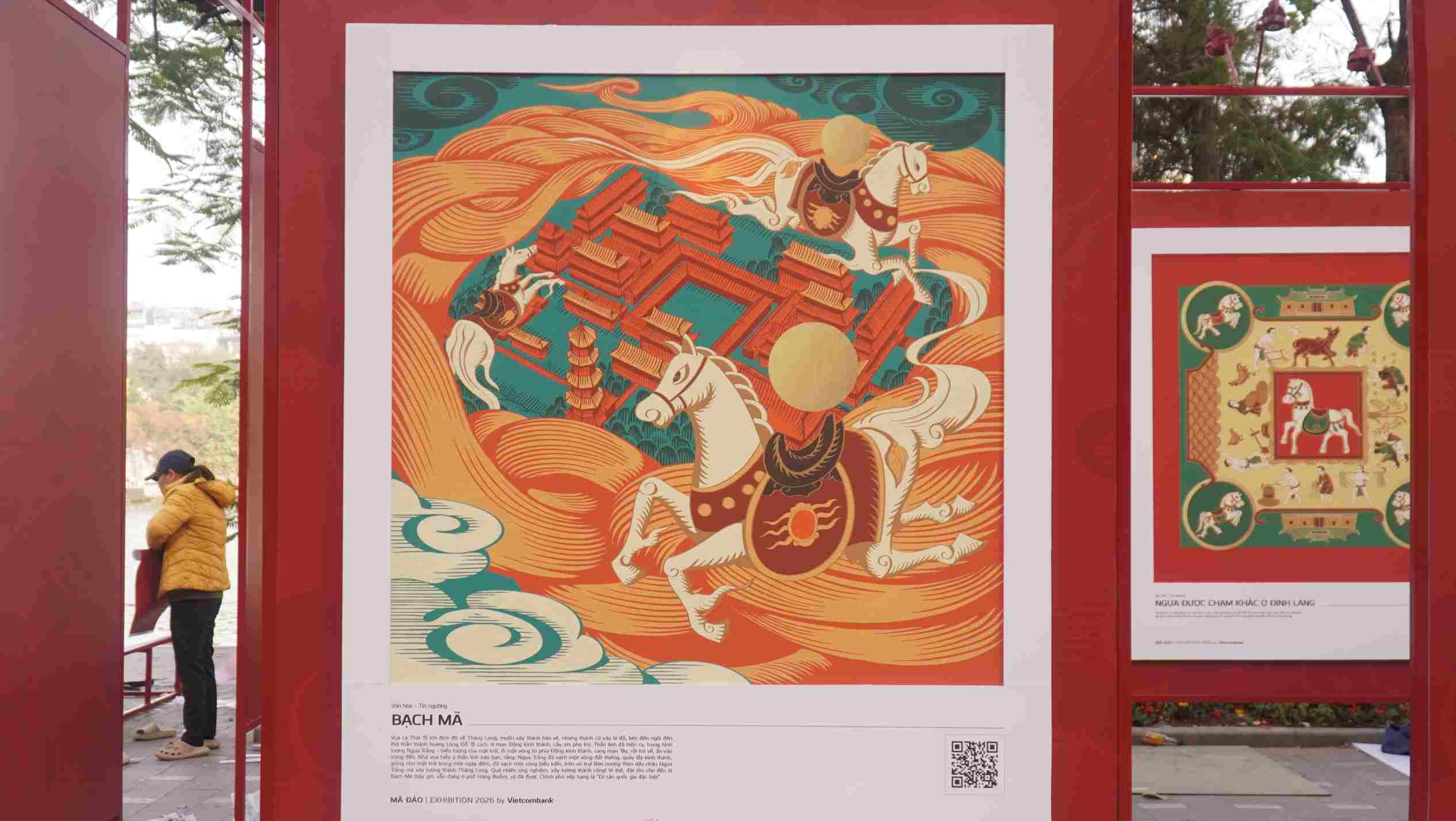 Buc tranh “Bach Ma” tai pho di bo ho Hoan Kiem. Anh: Minh Vu.