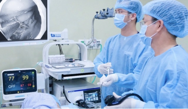 Doctor performing stomach endoscopy for a child patient. Photo: Phong Lan