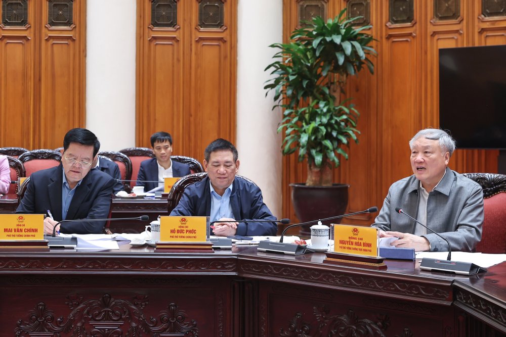 Pho Thu tuong Thuong truc Chinh phu Nguyen Hoa Binh, Pho Thu tuong Chinh phu Ho Duc Phoc va Pho Thu tuong Chinh phu Mai Van Chinh tai cuoc hop. Anh: VGP/Nhat Bac  