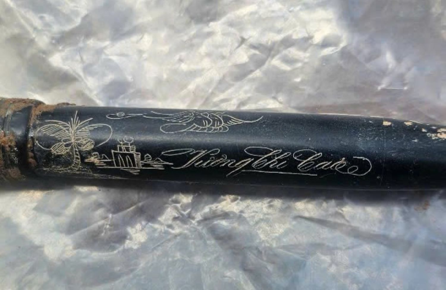 The artifact buried with the martyr's remains is a pen with a name engraved on it. Photo: 584 Martyrs' Remains Collection Team