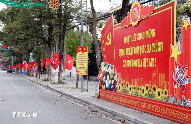 Central streets in localities are brilliantly decorated with flags and flowers to celebrate the 14th Party Congress. Photo: Van Dat/VNA